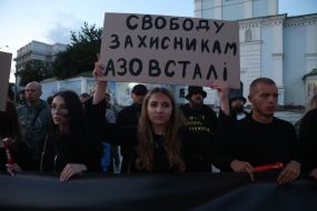 Participants of the open installation in memory of the fourth anniversary of the terrorist attack in Olenivka on Mykhailivska Square in Kyiv