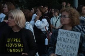 Participants of the open installation in memory of the fourth anniversary of the terrorist attack in Olenivka on Mykhailivska Square in Kyiv