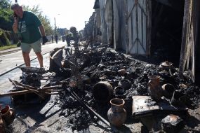 Shattered vintage and antique dishes after a missile strike on the antique market Barakholka on Pochaina in Kyiv