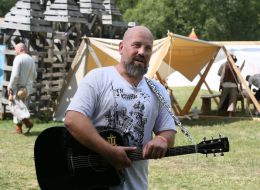 Musician with a wheeled lyre