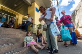 People evacuated from the Shevchenkivska community of the Kupyanskyi district at the IDP reception point in Kharkiv