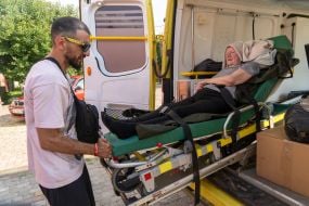 A man evacuated from the Shevchenkivska community of the Kupyanskyi district in an ambulance at the IDP reception point in Kharkiv