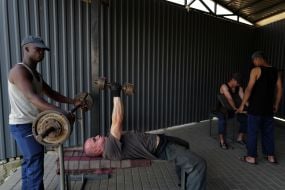 Prisoners of war exercise on exercise machines in one of the special camps for holding Russian prisoners of war