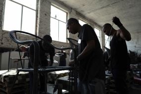 Prisoners of war working in the workshop in one of the special camps for holding Russian prisoners of war