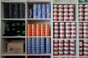 Shelves stocked with canned goods in one of the special camps for holding Russian prisoners of war