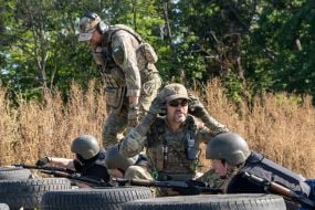 Civilians are being trained for national resistance at a training camp near Kharkiv
