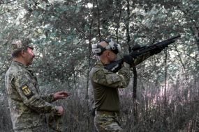 Civilians are being trained for national resistance at a training camp near Kharkiv