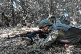 Civilians are being trained for national resistance at a training camp near Kharkiv