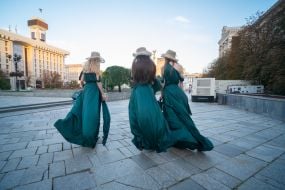 Girls advertise a new perfume store in the center of Kyiv