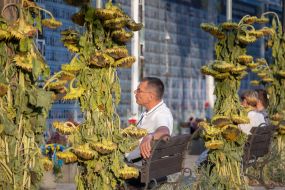 People near the Wall of Remembrance of the Fallen Defenders of Ukraine