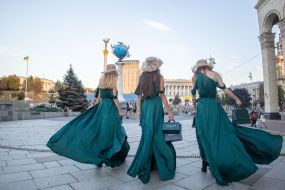 Girls advertise a new perfume store in the center of Kyiv