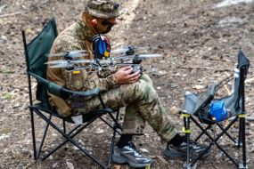 Training of fighters of the 13th brigade of the National Guard in a forest area