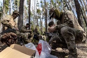 Training of fighters of the 13th brigade of the National Guard in a forest area
