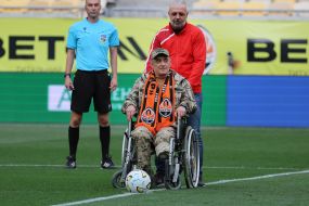 The soldier takes the ceremonial kick-off