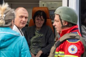 The injured woman in the ambulance