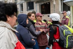 Local residents and municipal utility workers