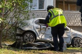 The body of a person killed in a Russian shelling attack