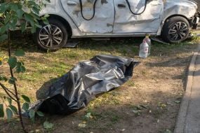 The body of a person killed in a Russian shelling attack