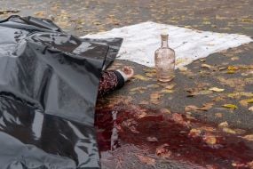 The body of a person killed in a Russian strike on a market in Kharkiv