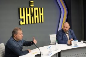 Volodymyr Omelchenko, Oleksii Buriachenko