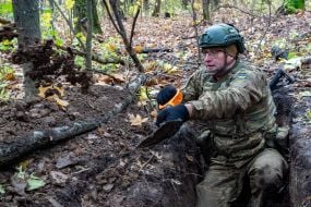 Troops from the 13th "Khartiya" Brigade of the National Guard of Ukraine conducted unit coordination training in a forested area