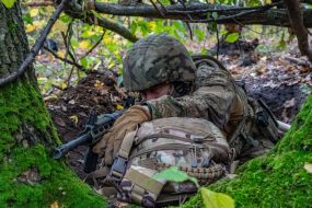 Troops from the 13th "Khartiya" Brigade of the National Guard of Ukraine conducted unit coordination training in a forested area