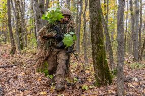 Troops from the 13th "Khartiya" Brigade of the National Guard of Ukraine conducted unit coordination training in a forested area