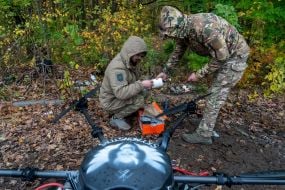 Troops from the 13th "Khartiya" Brigade of the National Guard of Ukraine conducted unit coordination training in a forested area