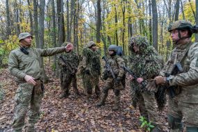 Troops from the 13th "Khartiya" Brigade of the National Guard of Ukraine conducted unit coordination training in a forested area