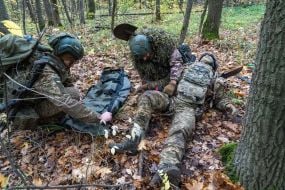Troops from the 13th "Khartiya" Brigade of the National Guard of Ukraine conducted unit coordination training in a forested area
