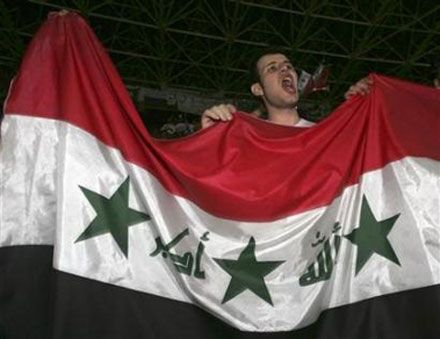 Fans celebrate Iraq`s victory over Saudi Arabia after the final match at the 2007 AFC Asian Cup soccer tournament
