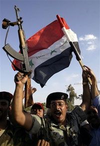 Fans celebrate Iraq`s victory over Saudi Arabia after the final match at the 2007 AFC Asian Cup soccer tournament