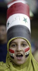 Fans celebrate Iraq`s victory over Saudi Arabia after the final match at the 2007 AFC Asian Cup soccer tournament