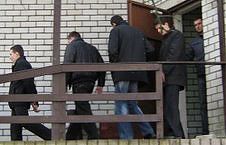 Білоруське КГБ обшукує житло журналіста (фото)