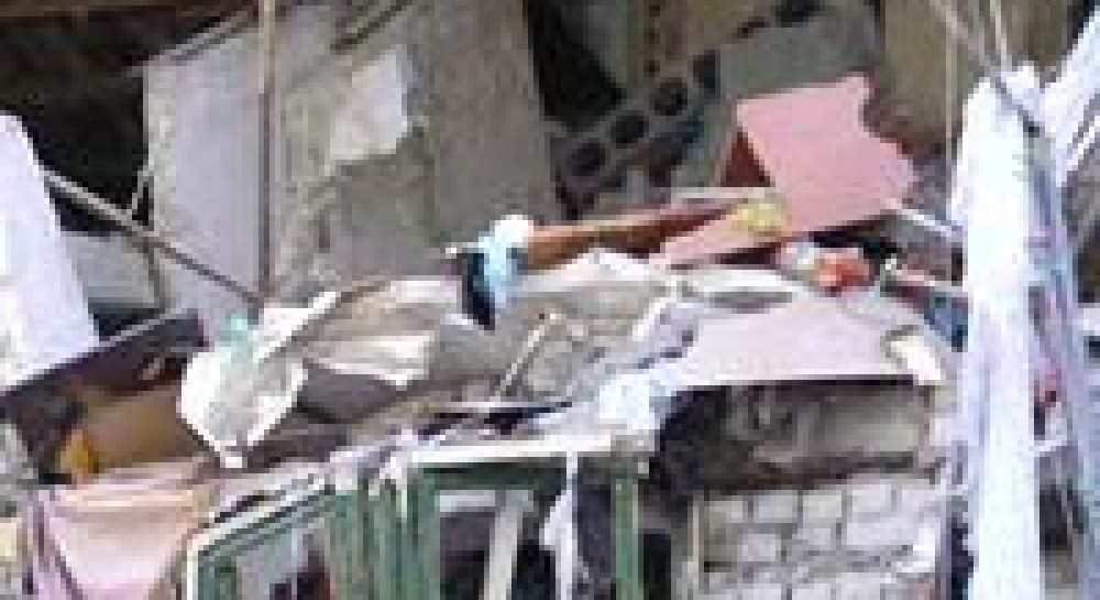 У жилому будинку в Ізюмі стався вибух (фоторепортаж)
