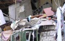 У жилому будинку в Ізюмі стався вибух (фоторепортаж)