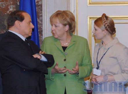 Юлія Тимошенко, канцлер Німеччини Ангела Меркель та прем’єр-міністр Італії Сильвіо Берлусконі 