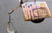 Експерти допускають, що девальвація гривні може відбутися вже у січні-лютому