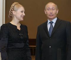 Юлия Тимошенко и Владимир Путин во время встречи в Астане. 22 мая