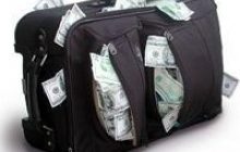 Тіньову схему виведення мільйонів доларів за кордон викрили харківські міліціонери