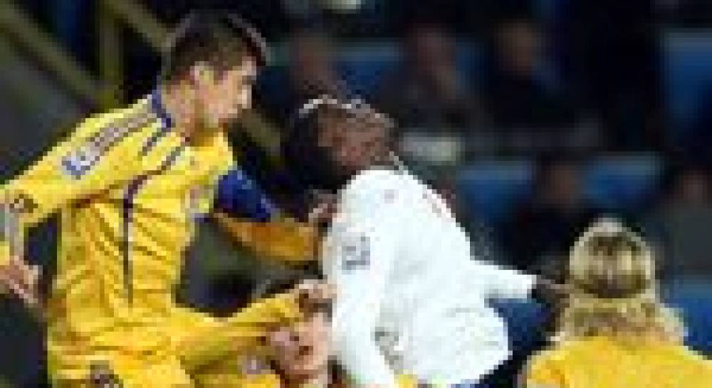 Ukraine beat 10-man England to boost 2010 hopes