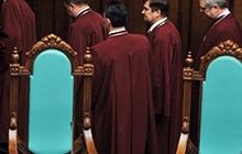 КС: Засуджені до позбавлення волі мають право на участь у судових засіданнях