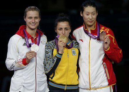 У китаянки Cунь Юйцзе (справа) Яна выиграла в полуфинале, а у немки Хайдеманн - в финале, фото Reuters