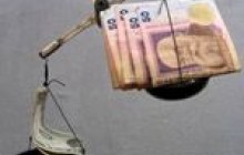 Експерти припускають, що девальвація гривні може відбутися вже у січні-лютому