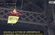 Альпініст піднявся на Ейфелеву вежу на підтримку арештованих активістів Greenpeace (фото)