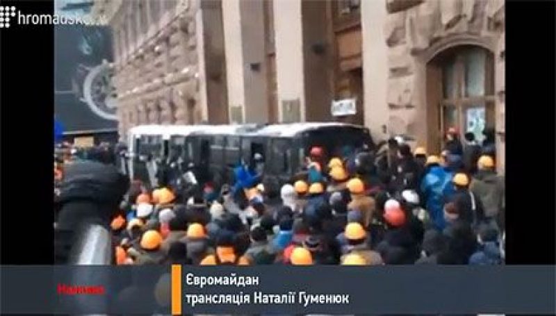 Three buses with Berkut are near the building