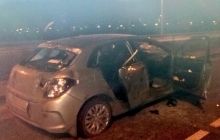 Колона ”Беркута”, яка рухається в центр Києва, розбила машину активіста Автомайдану