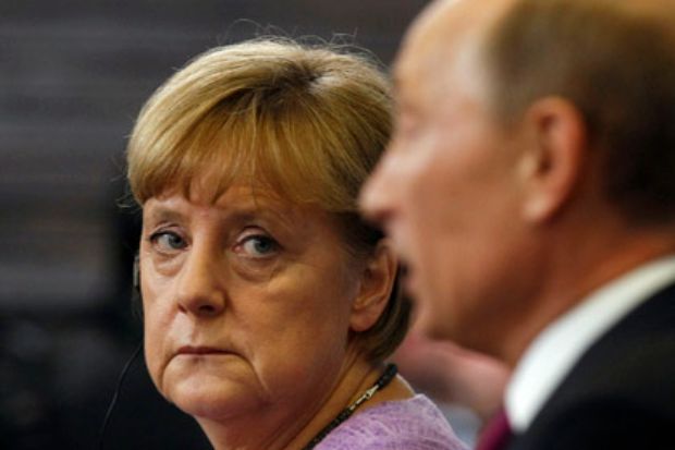 Ангела Меркель и Владимир Путин / REUTERS