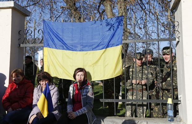 Если кто и ущемлен  правах, то это украинцы / REUTERS