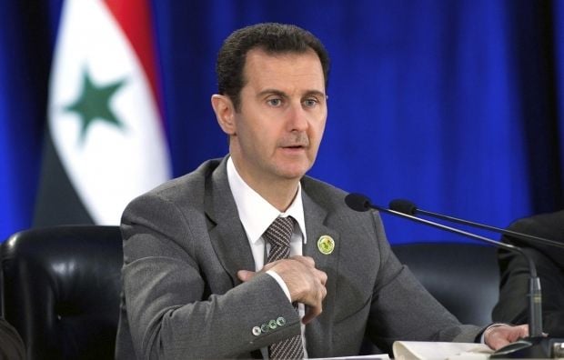 Башар Ассад уверяет, что не собирается бедать из страны / REUTERS